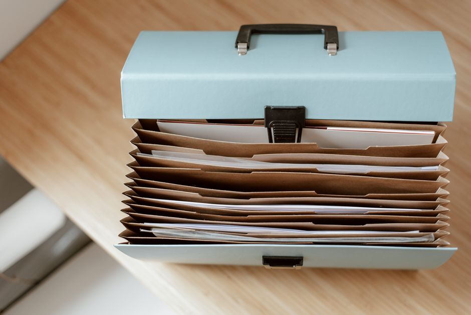 Document folder open on a desk