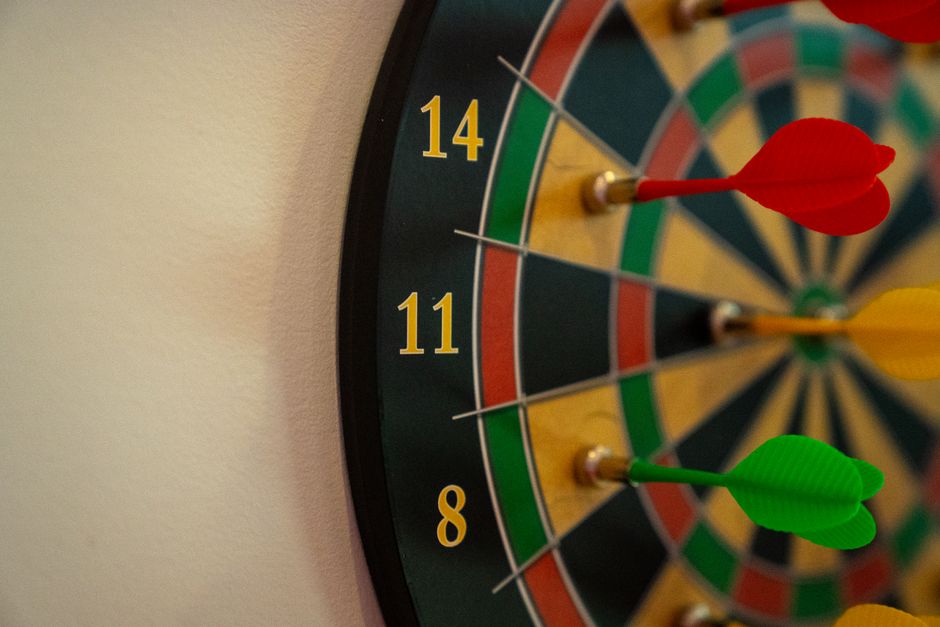 Darts landed near the center of a dartboard